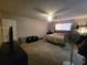 Bright main bedroom featuring neutral walls, carpet floors, a ceiling fan and natural light at 3321 Border Dr, Stone Mountain, GA 30087