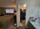 Main bedroom and walk-in closet featuring neutral walls and carpet floors at 3321 Border Dr, Stone Mountain, GA 30087