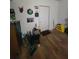Room featuring laminate flooring, accessories and ample space, ideal for storage at 3321 Border Dr, Stone Mountain, GA 30087