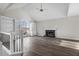 Bright living room with hardwood floors, fireplace and built-in shelving at 2718 Beaver Creek Xing, Powder Springs, GA 30127