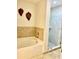 Bathroom with soaking tub and walk-in shower at 870 Mayson Turner Rd # 1326, Atlanta, GA 30314