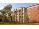Apartment building with landscaped grounds and trees at 870 Mayson Turner Rd # 1326, Atlanta, GA 30314