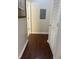 Hallway with wood flooring and access to other rooms at 870 Mayson Turner Rd # 1326, Atlanta, GA 30314