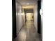 Clean and bright hallway with wood-look flooring at 870 Mayson Turner Rd # 1326, Atlanta, GA 30314