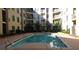 Inviting rectangular pool surrounded by a patio at 870 Mayson Turner Rd # 1326, Atlanta, GA 30314