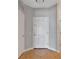 A neutral toned entryway featuring tile flooring, a white front door and white trim at 3475 Oak Valley Ne Rd # 1930, Atlanta, GA 30326