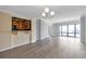 Living area with hardwood flooring, white trim and tan and grey walls at 3475 Oak Valley Ne Rd # 1930, Atlanta, GA 30326