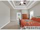 View of the bedroom with high tray ceilings and natural lighting at 3000 Smyrna Grove Dr, Smyrna, GA 30082