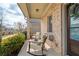 Relaxing front porch with comfortable seating, offering a perfect spot to enjoy the neighborhood views at 3000 Smyrna Grove Dr, Smyrna, GA 30082