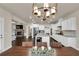 A lovely kitchen in an open floor plan, featuring granite countertops and stainless steel appliances at 3000 Smyrna Grove Dr, Smyrna, GA 30082