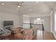 The living room features hardwood floors, a ceiling fan, and comfortable furniture at 3000 Smyrna Grove Dr, Smyrna, GA 30082