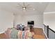 Spacious living room featuring hardwood floors, a ceiling fan, and comfortable seating at 3000 Smyrna Grove Dr, Smyrna, GA 30082