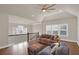 Hardwood floors, a ceiling fan, and comfortable furniture highlight the living room at 3000 Smyrna Grove Dr, Smyrna, GA 30082