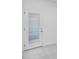 Bright white door with window and blinds and new gray carpeting at 320 Oldvine Dr, Lawrenceville, GA 30044