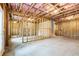 Unfinished basement with exposed framing and concrete floor at 386 10Th Unit 57 St, Auburn, GA 30011