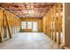 Unfinished basement with exposed framing and concrete floor at 386 10Th Unit 57 St, Auburn, GA 30011