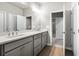 Double vanity bathroom with access to a bedroom at 386 10Th Unit 57 St, Auburn, GA 30011