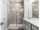 Bathroom with double vanity and walk-in shower at 386 10Th Unit 57 St, Auburn, GA 30011