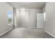 Well-lit bedroom with carpet and window at 386 10Th Unit 57 St, Auburn, GA 30011
