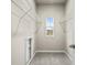 Large walk-in closet with wire shelving and window at 386 10Th Unit 57 St, Auburn, GA 30011