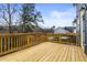 Deck with wooden railings and view of neighborhood at 386 10Th Unit 57 St, Auburn, GA 30011