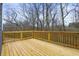 Wooden deck overlooks a wooded area at 386 10Th Unit 57 St, Auburn, GA 30011