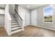 Bright entryway with stairs and door to the outside at 386 10Th Unit 57 St, Auburn, GA 30011