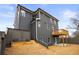 Gray house exterior with deck and landscaped yard at 386 10Th Unit 57 St, Auburn, GA 30011