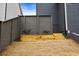 Landscaped yard with retaining wall and plants at 386 10Th Unit 57 St, Auburn, GA 30011