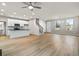 Open concept living room and kitchen with hardwood floors at 386 10Th Unit 57 St, Auburn, GA 30011