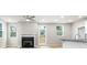 Living room with hardwood floors, fireplace, and access to deck at 386 10Th Unit 57 St, Auburn, GA 30011