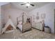 Charming bedroom with a canopy bed, teepee, and ample storage at 4824 Archer Pl, Acworth, GA 30101
