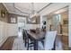 Spacious dining room with hardwood floors and stylish light fixture at 4824 Archer Pl, Acworth, GA 30101