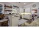 Updated kitchen with granite countertops, white cabinets, and stainless steel appliances at 4824 Archer Pl, Acworth, GA 30101