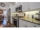 Well-equipped kitchen featuring granite countertops and stainless steel appliances at 4824 Archer Pl, Acworth, GA 30101