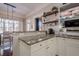 Modern kitchen with granite countertops and white cabinets at 4824 Archer Pl, Acworth, GA 30101