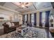Living room with hardwood floors, comfy seating, and large windows at 4824 Archer Pl, Acworth, GA 30101