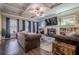 Spacious living room with fireplace and coffered ceiling at 4824 Archer Pl, Acworth, GA 30101