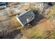 Aerial view of house and backyard, highlighting deck and lot size at 135 Trelawney Pl, Covington, GA 30016