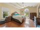 Main bedroom with hardwood floors and large windows at 2817 Crestwicke Nw Dr, Kennesaw, GA 30152