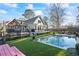House with a pool, deck, and fenced backyard at 3051 Maple Ln, Alpharetta, GA 30009