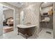 Elegant bathroom with freestanding tub, marble flooring, and walk-in shower at 3051 Maple Ln, Alpharetta, GA 30009