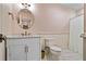 Basement bathroom with white vanity, marble countertop, and shower at 3051 Maple Ln, Alpharetta, GA 30009