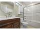 Clean bathroom with herringbone tile shower and modern vanity at 3051 Maple Ln, Alpharetta, GA 30009