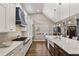 Gourmet kitchen featuring a large island and high-end appliances at 3051 Maple Ln, Alpharetta, GA 30009