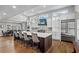 Spacious kitchen with large island, white cabinets, and stainless steel appliances at 3051 Maple Ln, Alpharetta, GA 30009