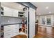 Well-organized pantry with white cabinets and corner shelving at 3051 Maple Ln, Alpharetta, GA 30009