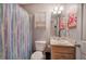 Clean bathroom with shower and updated vanity at 90 Greatwood Dr, White, GA 30184