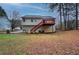 House exterior with deck and stairs at 90 Greatwood Dr, White, GA 30184