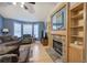 Living room featuring a stone fireplace and built-in shelving at 90 Greatwood Dr, White, GA 30184